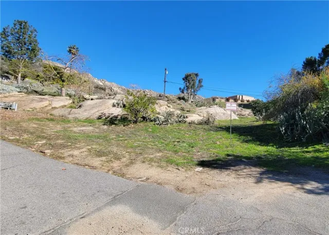 a view of a backyard of a house