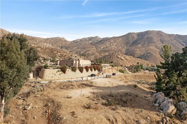 a view of a mountain view with mountains in the background