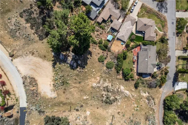 a aerial view of a house with a yard