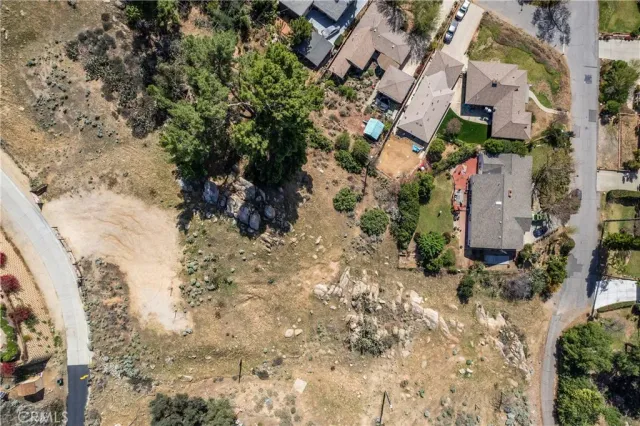 a aerial view of a house with a yard