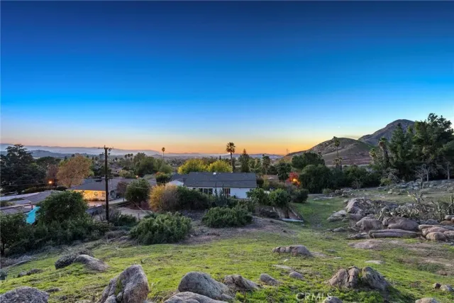 a view of a lake with a yard