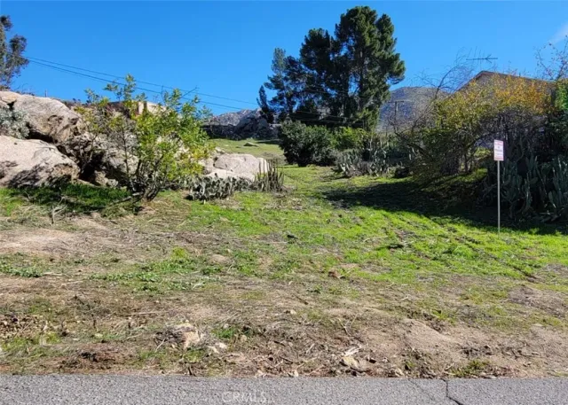 a view of a backyard of a house