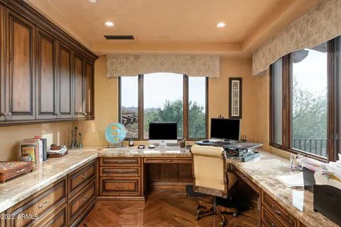 a room with a large window and a sink