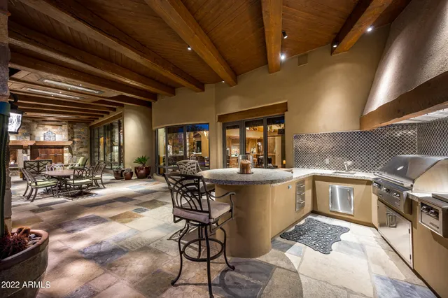 a kitchen with counter top space and appliances