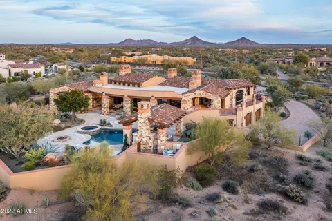 a view of a city with mountains in the background