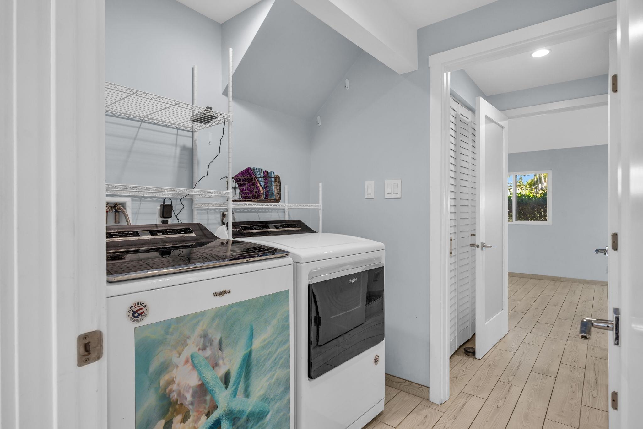 100 Auhana Road, Unit 103 Kihei, HI 96753 - Photo 13 of 43 a kitchen with a stove and a refrigerator