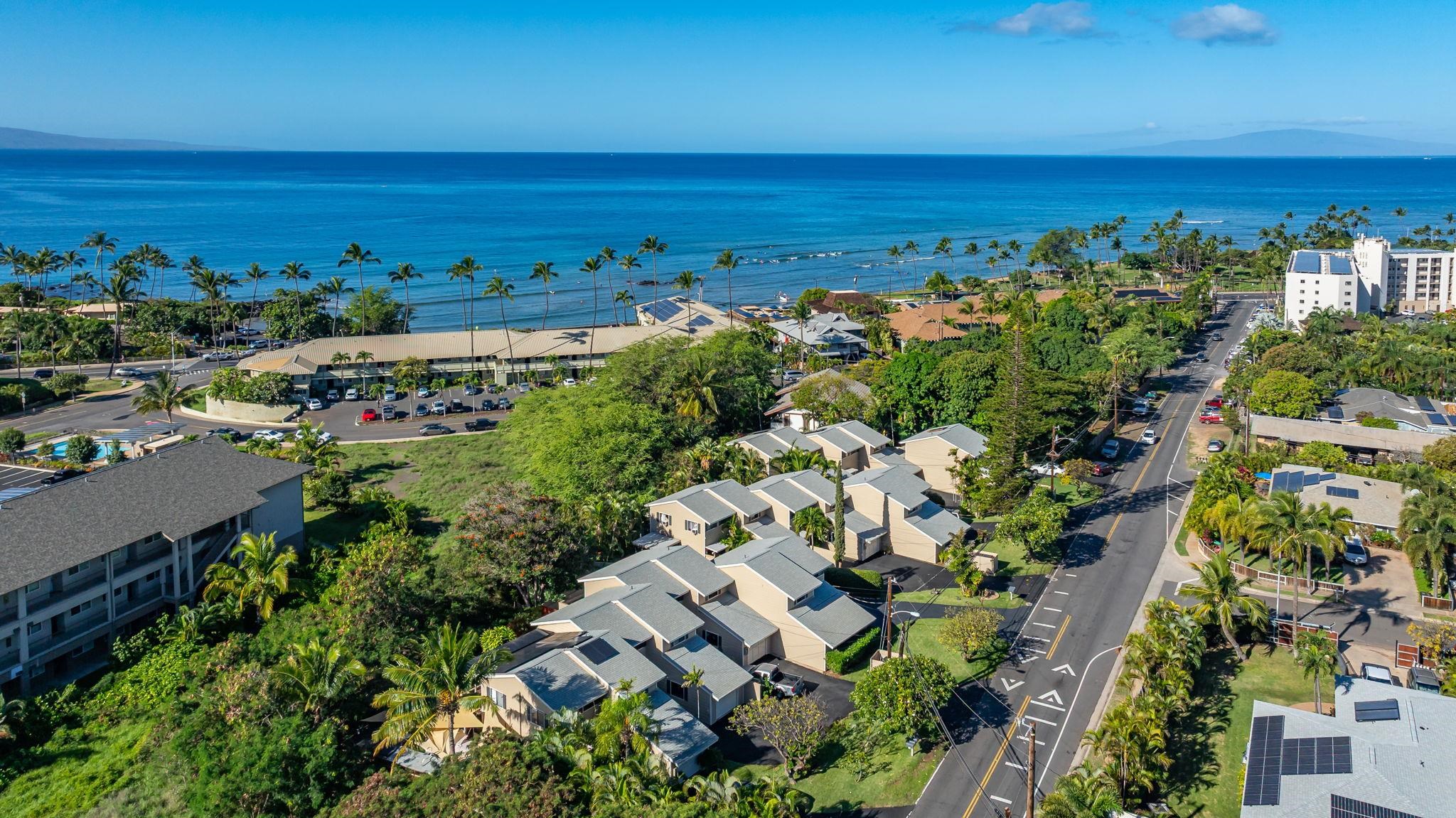 100 Auhana Road, Unit 103 Kihei, HI 96753 - Photo 2 of 43 a view of city and ocean