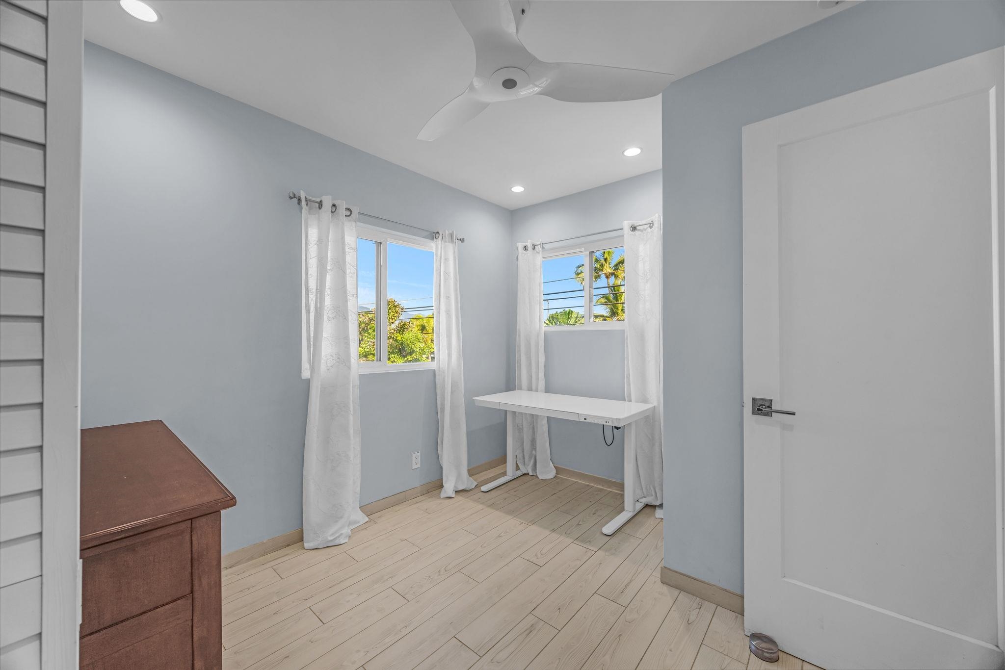 100 Auhana Road, Unit 103 Kihei, HI 96753 - Photo 23 of 43 a view of kitchen with furniture and window