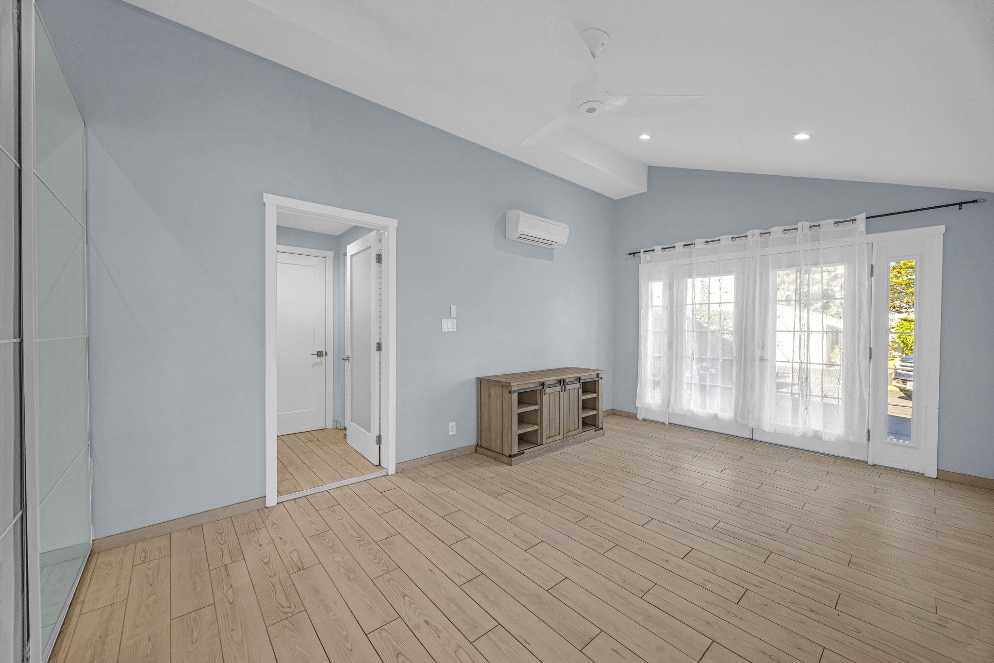 100 Auhana Road, Unit 103 Kihei, HI 96753 - Photo 36 of 43 a view of an empty room with a window