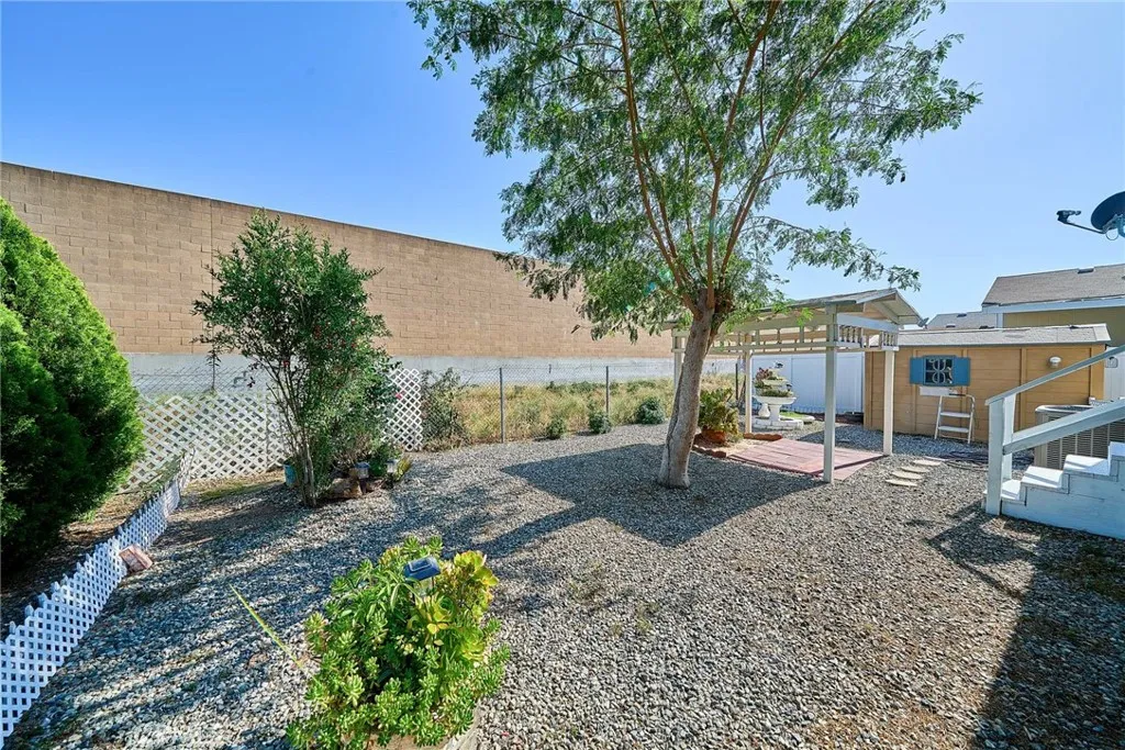 4000 Pierce Street, Unit 168 Riverside, CA 92505 - Photo 28 of 34 a view of a house with backyard and sitting area