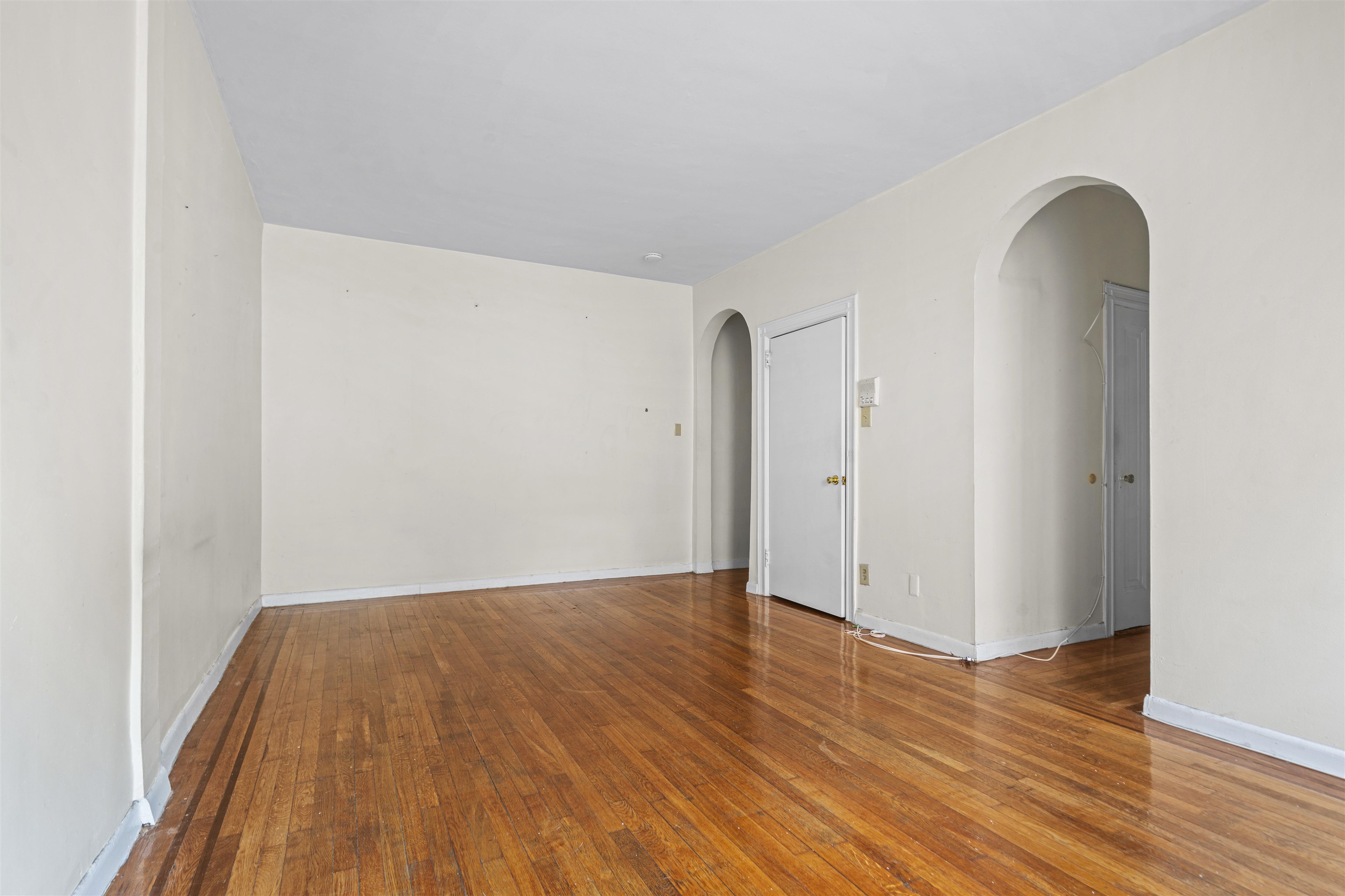 821 Bergen Avenue, Unit B5 Jersey City, NJ 07306 - Photo 4 of 13 a view of a room with wooden floor
