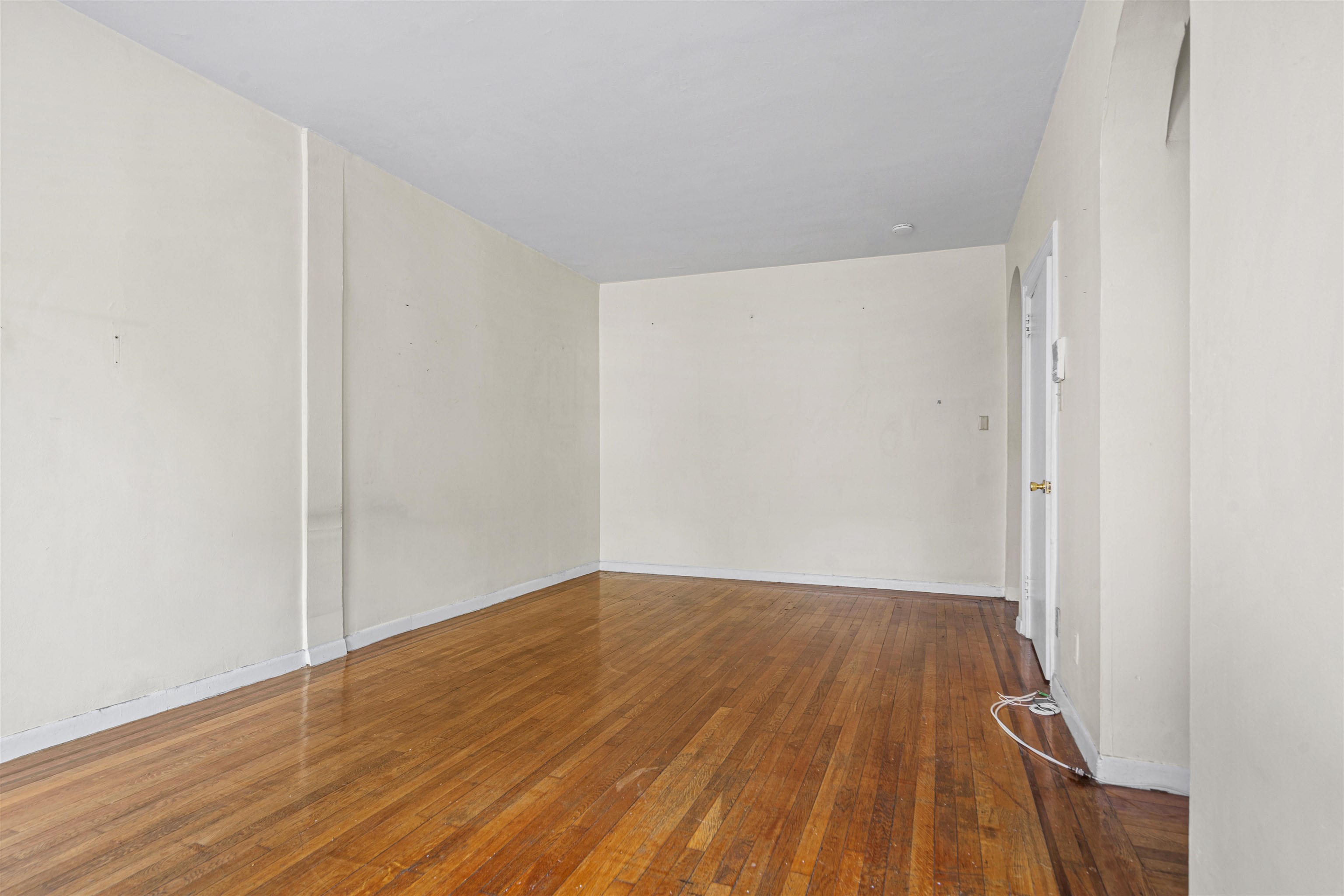 821 Bergen Avenue, Unit B5 Jersey City, NJ 07306 - Photo 8 of 13 a view of a room with wooden floor