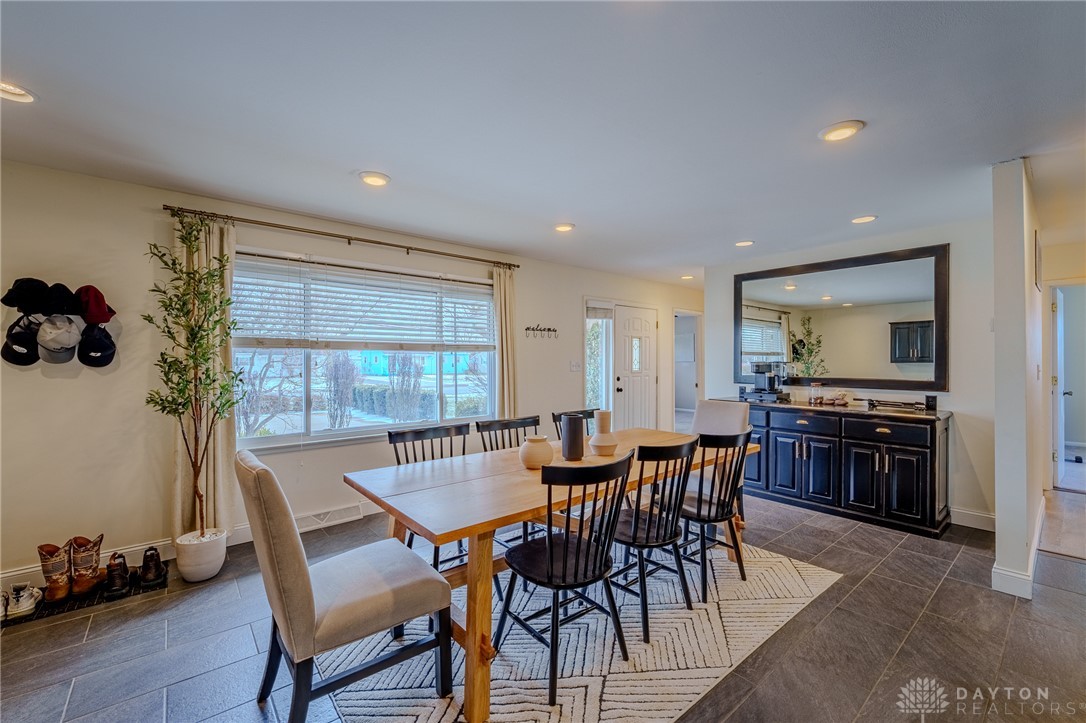 305 South Vandemark Road Sidney, OH 45365 - Photo 14 of 32 This bright dining area features an inviting ambiance and practical flooring.