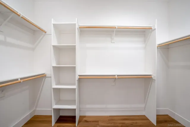 a view of an empty walk in closet