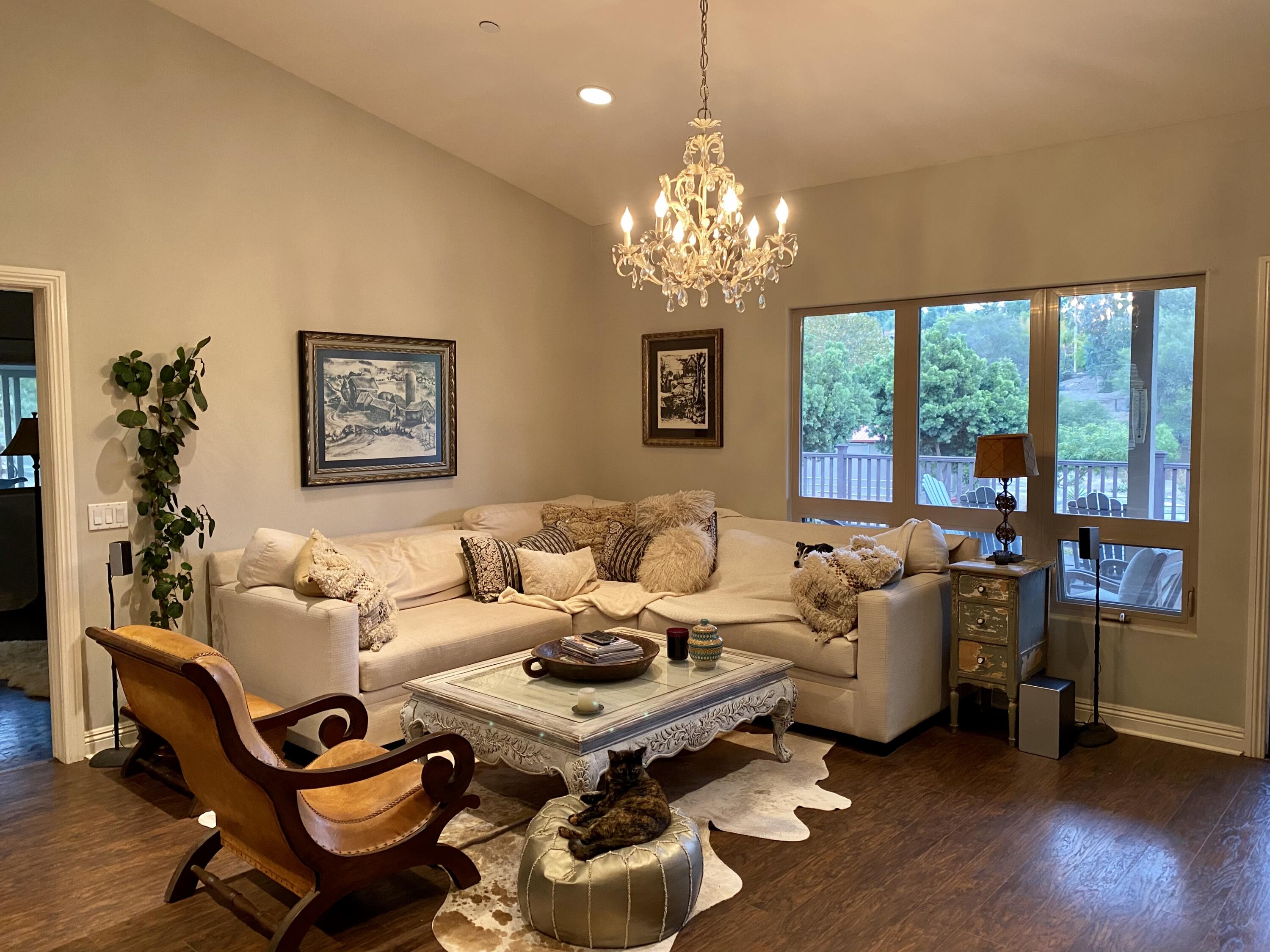 3705 La Canada Road Fallbrook, CA 92028 - Photo 21 of 68 a living room with furniture chandelier and a chandelier