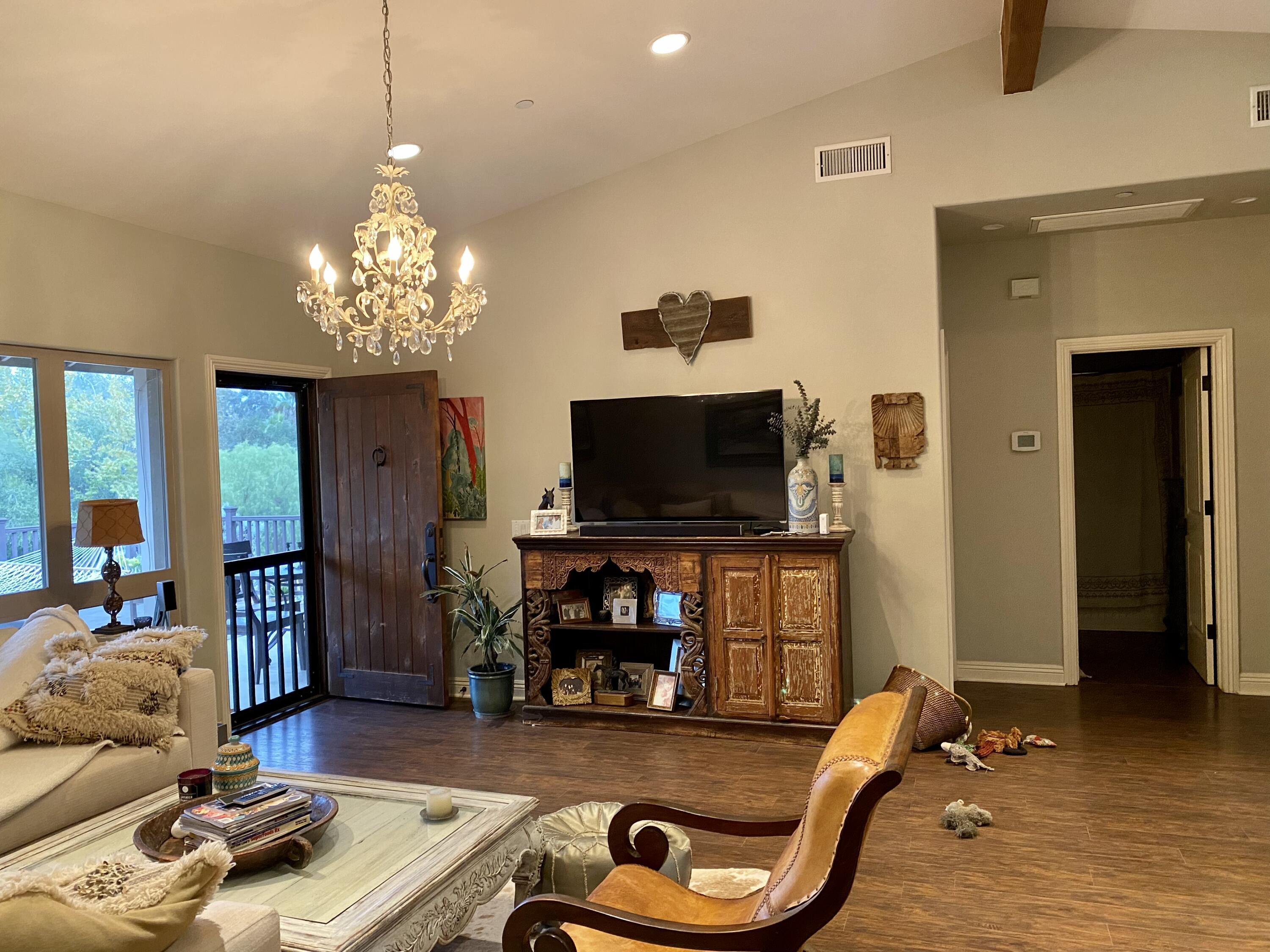 3705 La Canada Road Fallbrook, CA 92028 - Photo 23 of 68 a living room with furniture and a flat screen tv