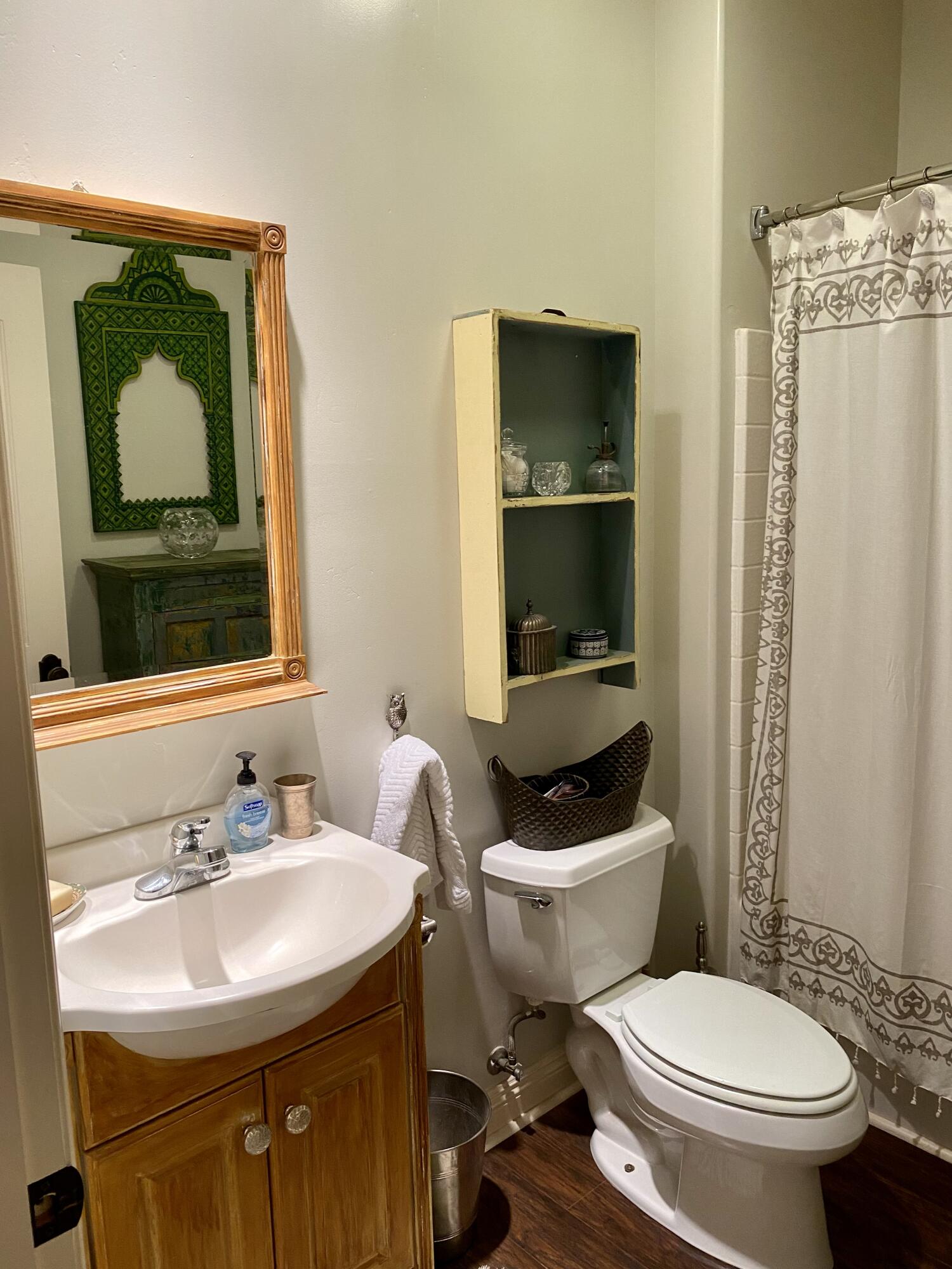 3705 La Canada Road Fallbrook, CA 92028 - Photo 29 of 68 a bathroom with a toilet a sink and a mirror
