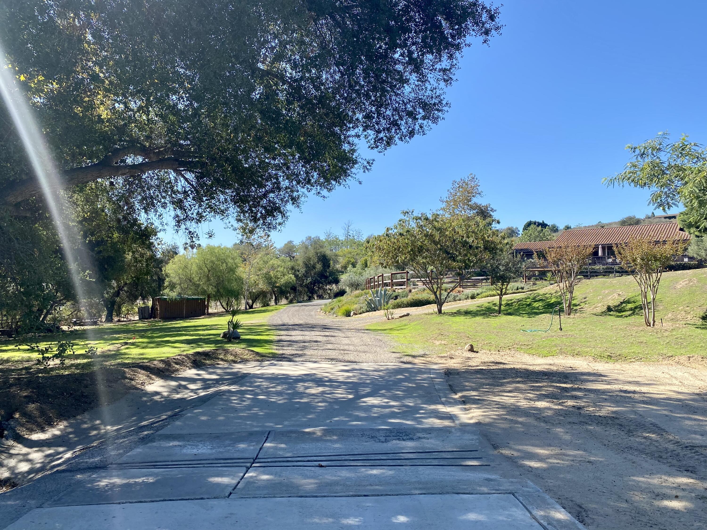 3705 La Canada Road Fallbrook, CA 92028 - Photo 4 of 68 a view of a swimming pool and a yard