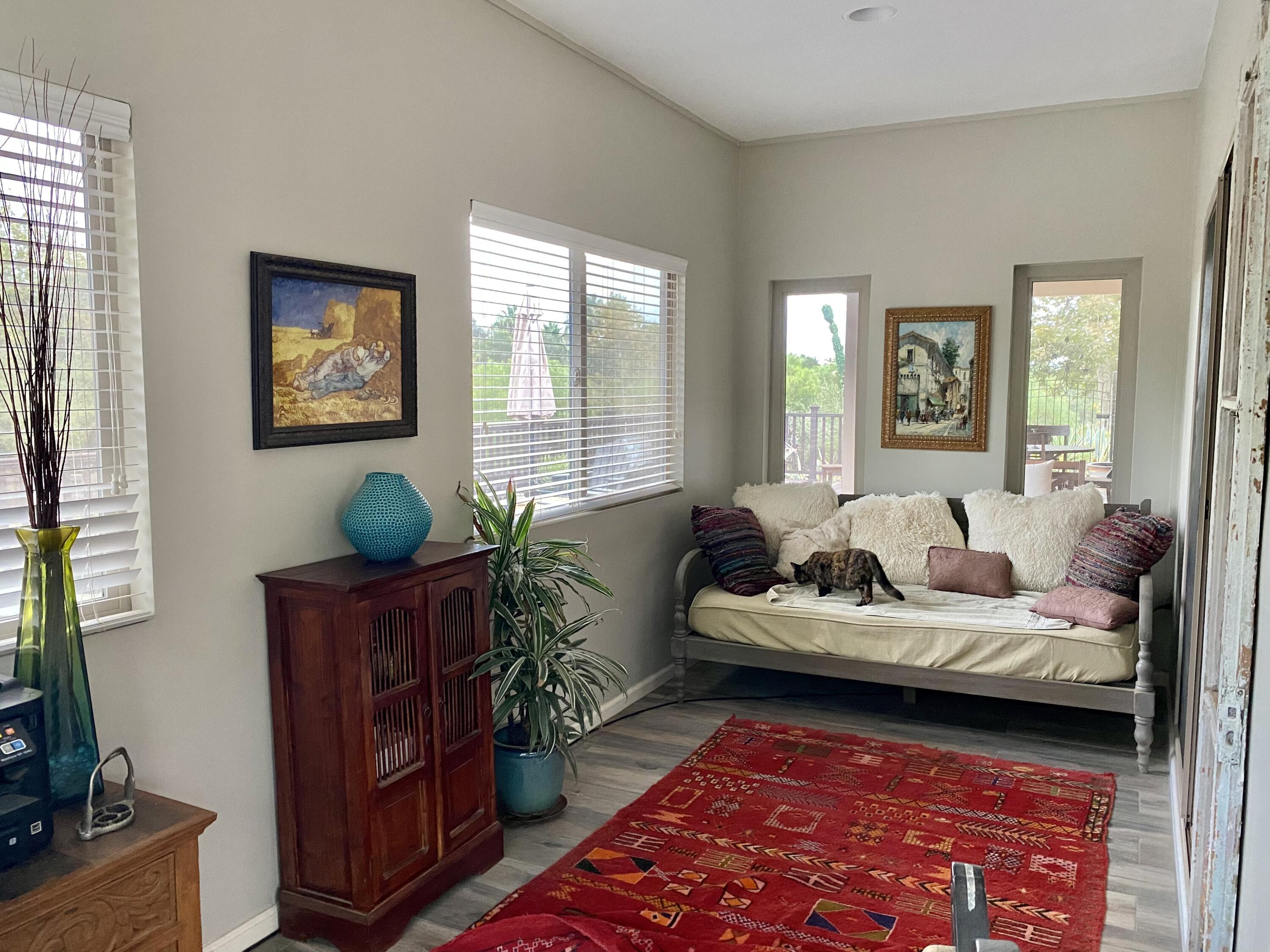 3705 La Canada Road Fallbrook, CA 92028 - Photo 31 of 68 a living room with furniture and a rug