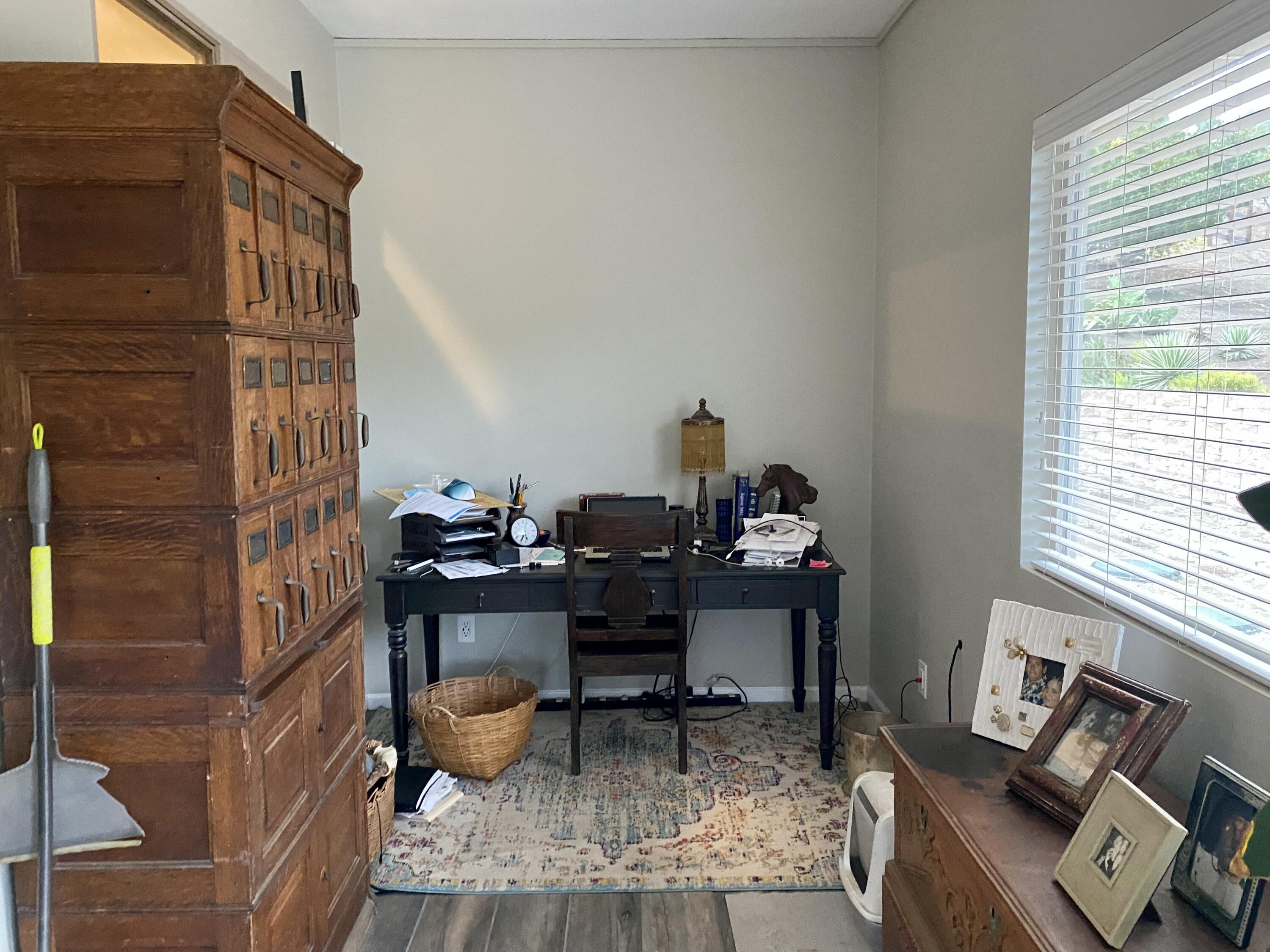 3705 La Canada Road Fallbrook, CA 92028 - Photo 32 of 68 a living room with furniture and a window