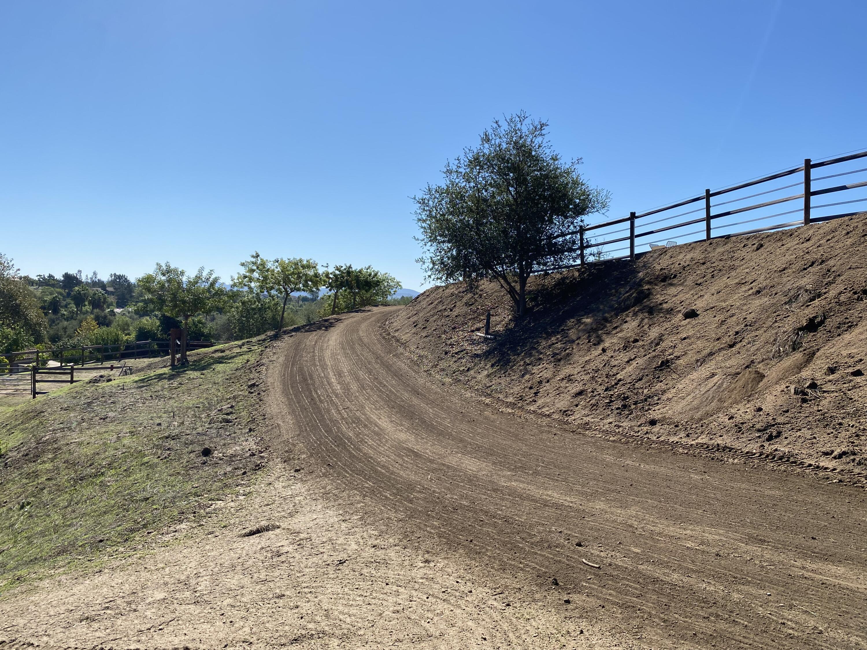 3705 La Canada Road Fallbrook, CA 92028 - Photo 52 of 68 a view of a dry yard with wooden fence