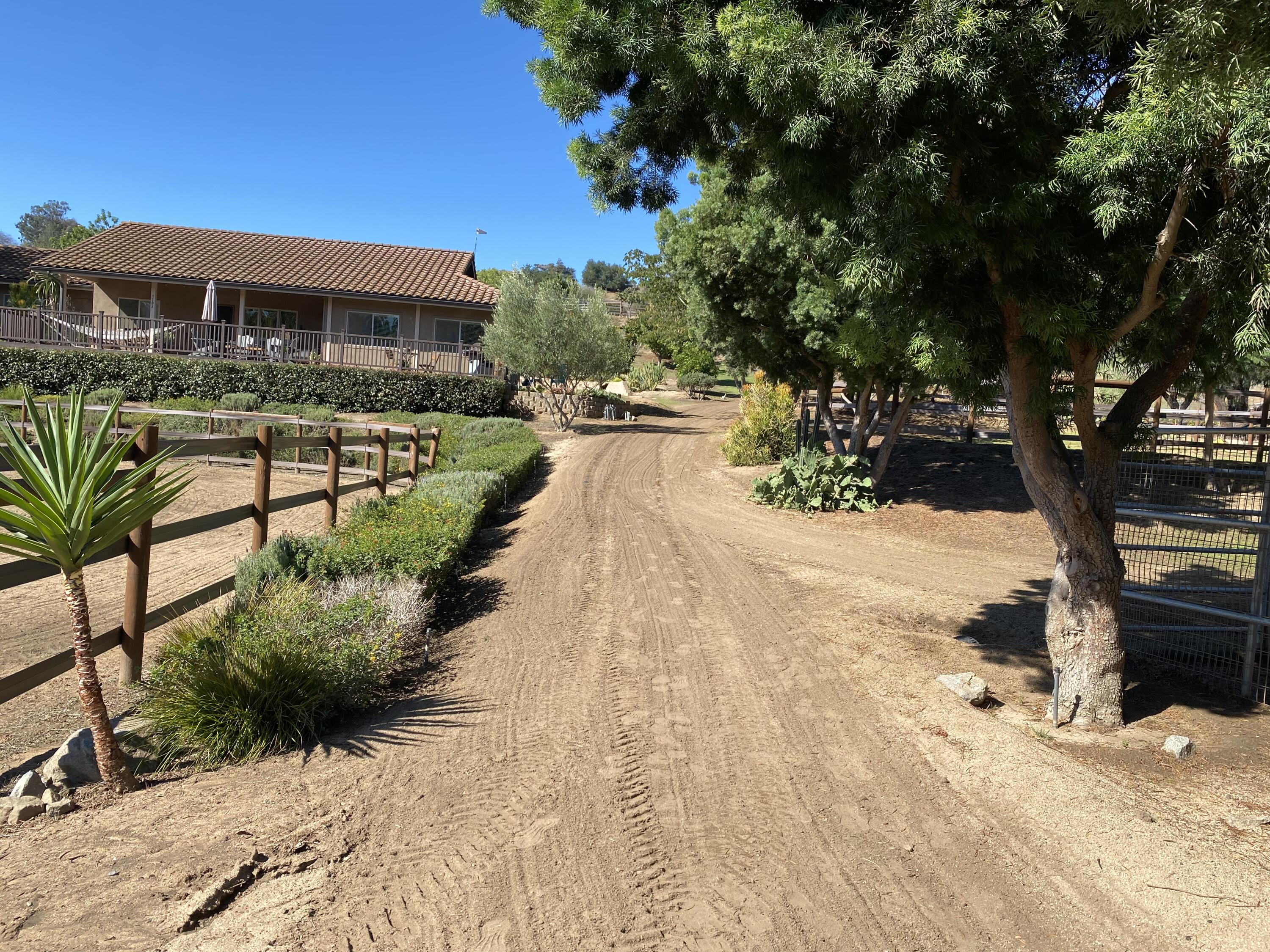 3705 La Canada Road Fallbrook, CA 92028 - Photo 55 of 68 a view of a house with a yard covered in snow