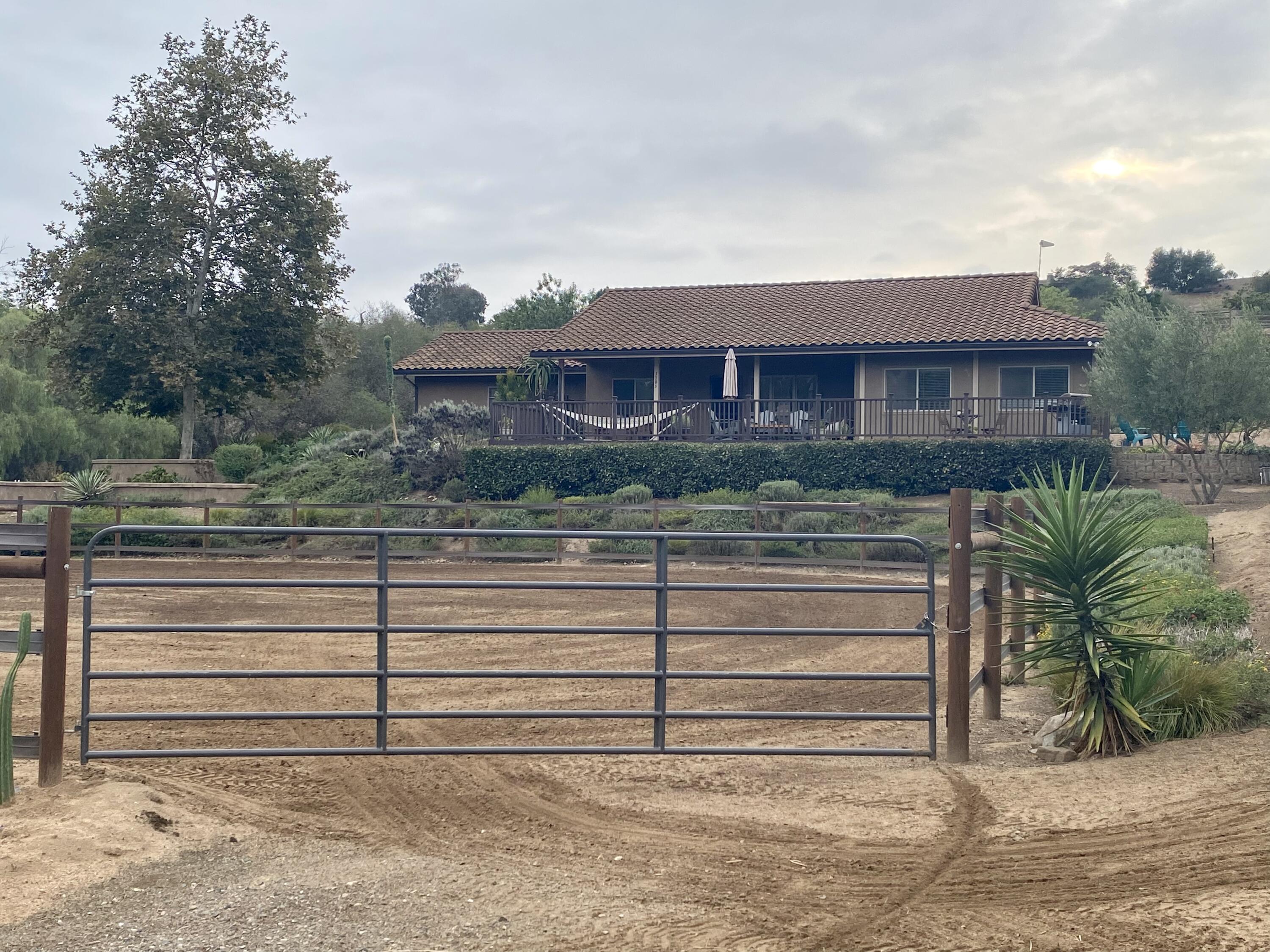 3705 La Canada Road Fallbrook, CA 92028 - Photo 62 of 68 a view of a house with a yard