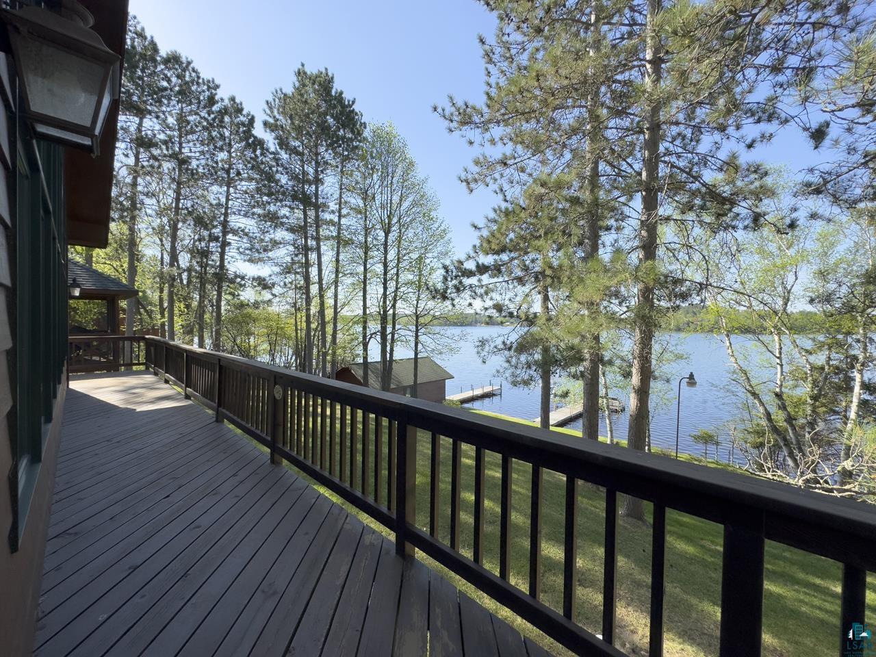 1880 Everett Bay Road Tower, MN 55790 - Photo 27 of 50 Wooden deck with a water view and a dock