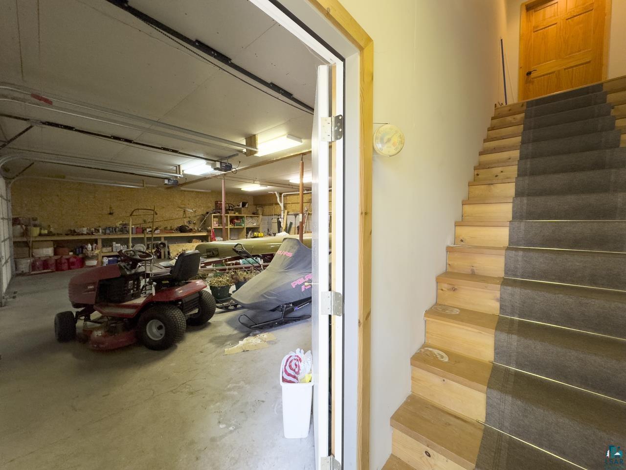 1880 Everett Bay Road Tower, MN 55790 - Photo 37 of 50 Stairway with concrete flooring