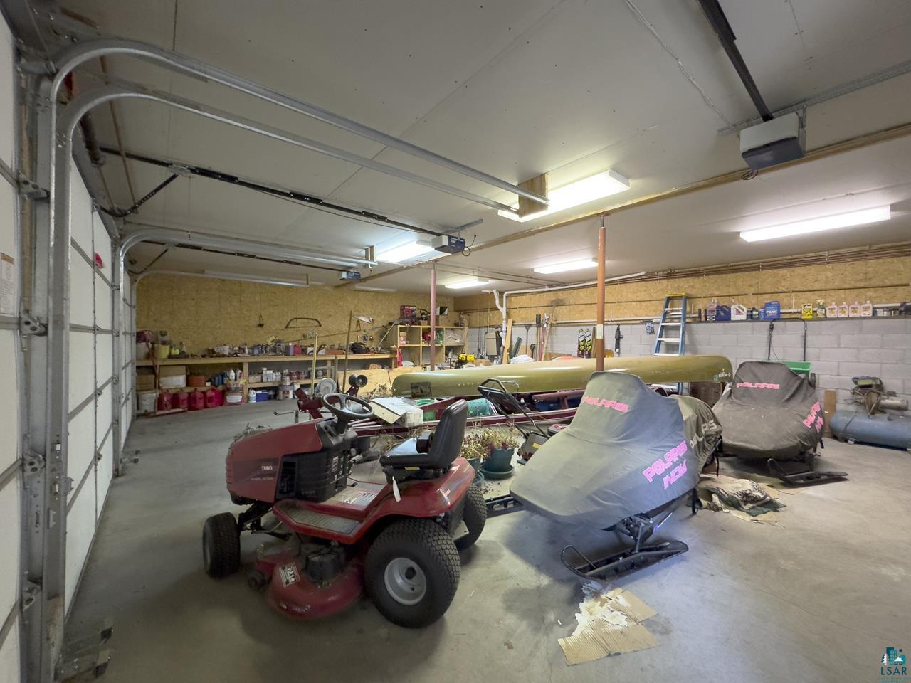 1880 Everett Bay Road Tower, MN 55790 - Photo 38 of 50 Garage with a garage door opener