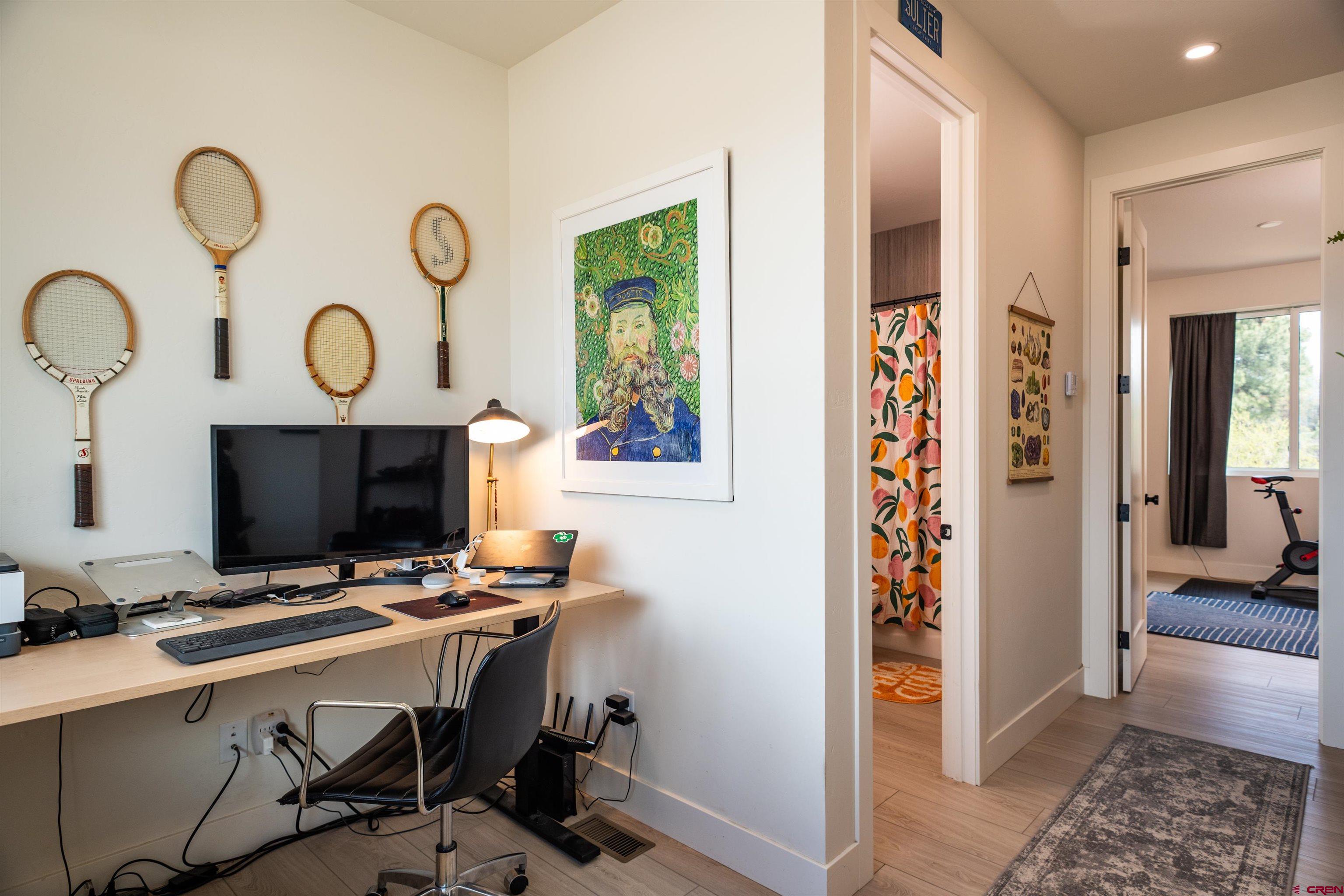 101 Elevation Drive Durango, CO 81303 - Photo 17 of 25 a view of a workspace with furniture and a window