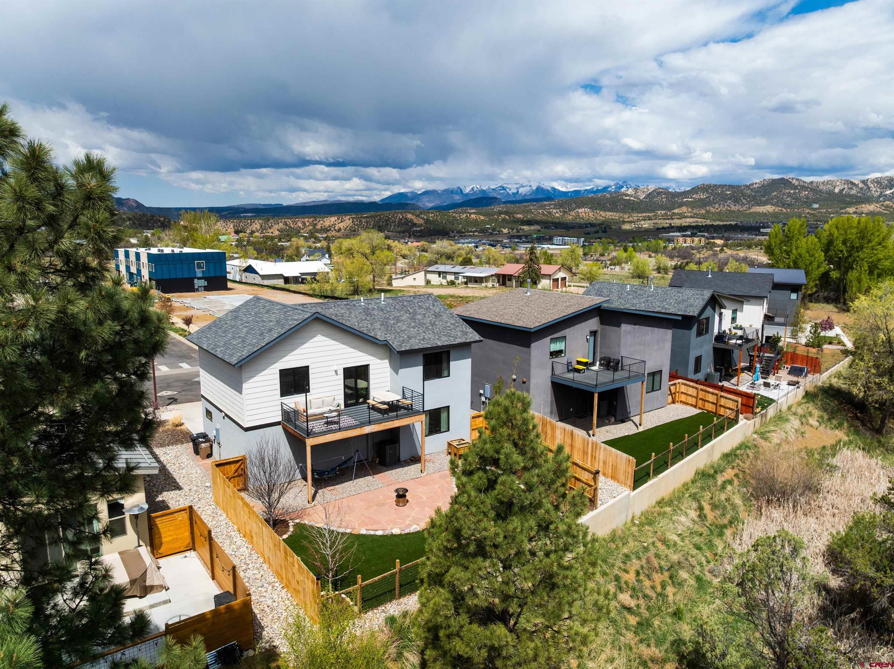 101 Elevation Drive Durango, CO 81303 - Photo 20 of 25 a view of a house with a swimming pool and sitting area