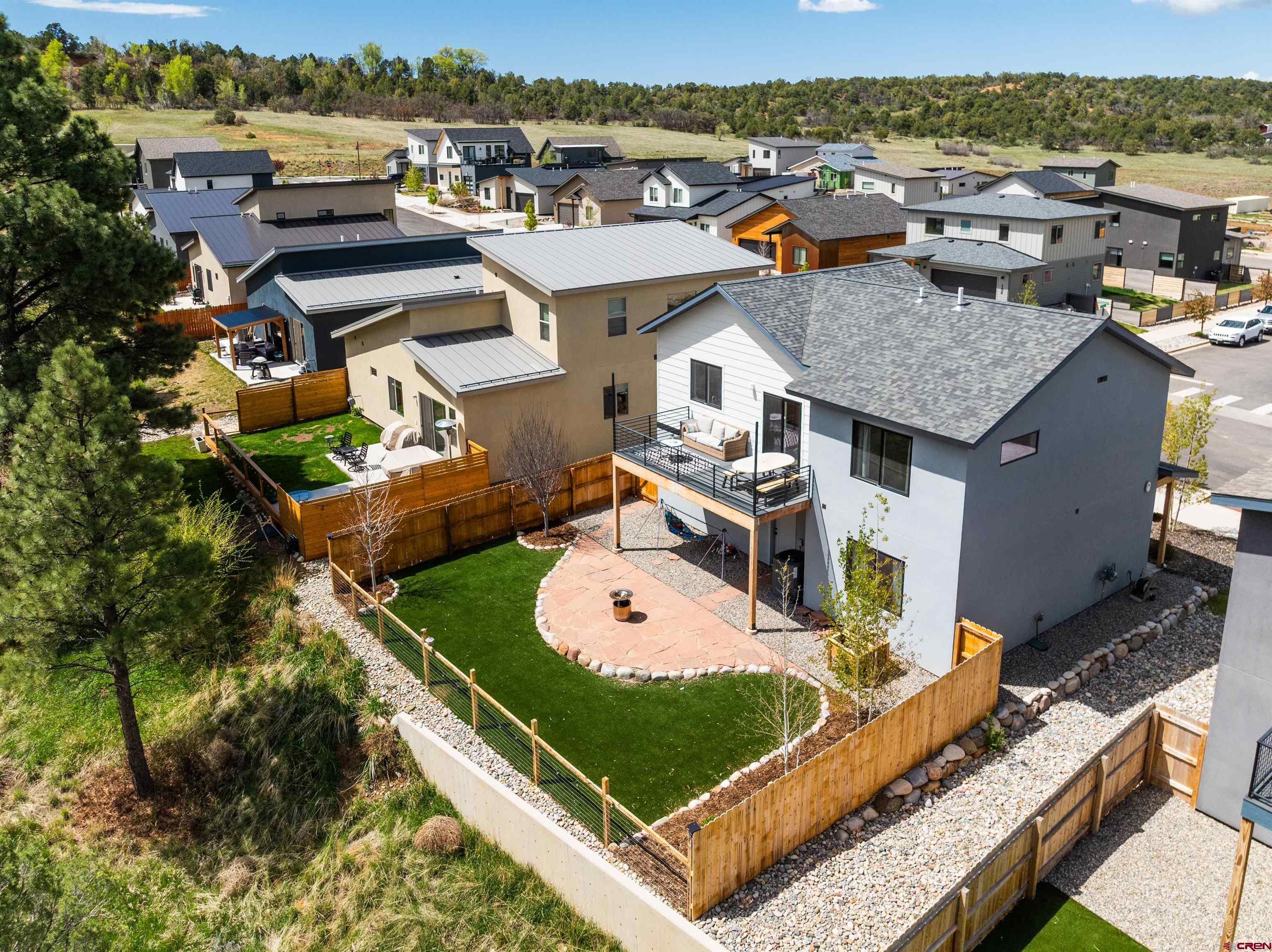 101 Elevation Drive Durango, CO 81303 - Photo 21 of 25 an aerial view of a house with a garden and lake view