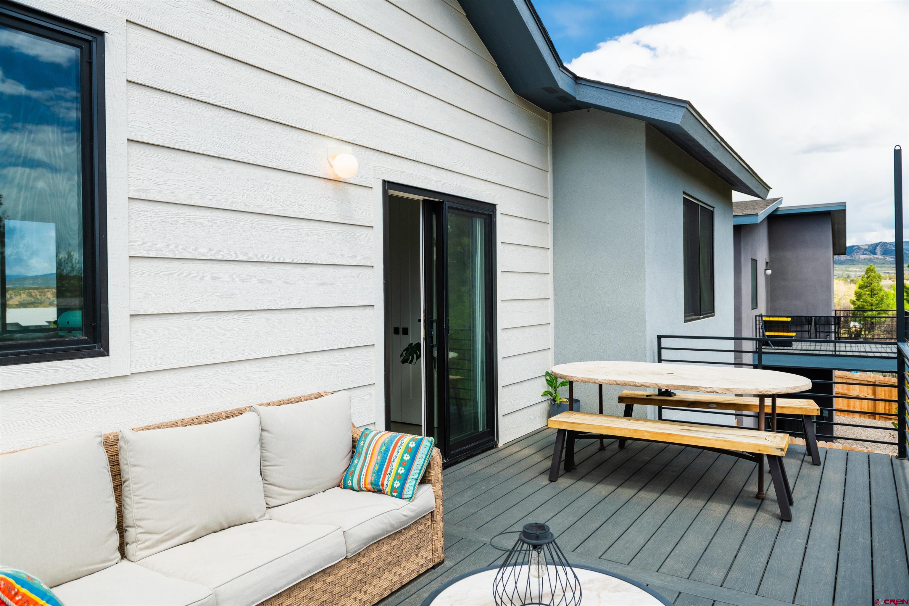 101 Elevation Drive Durango, CO 81303 - Photo 9 of 25 a living room with furniture and a wooden floor