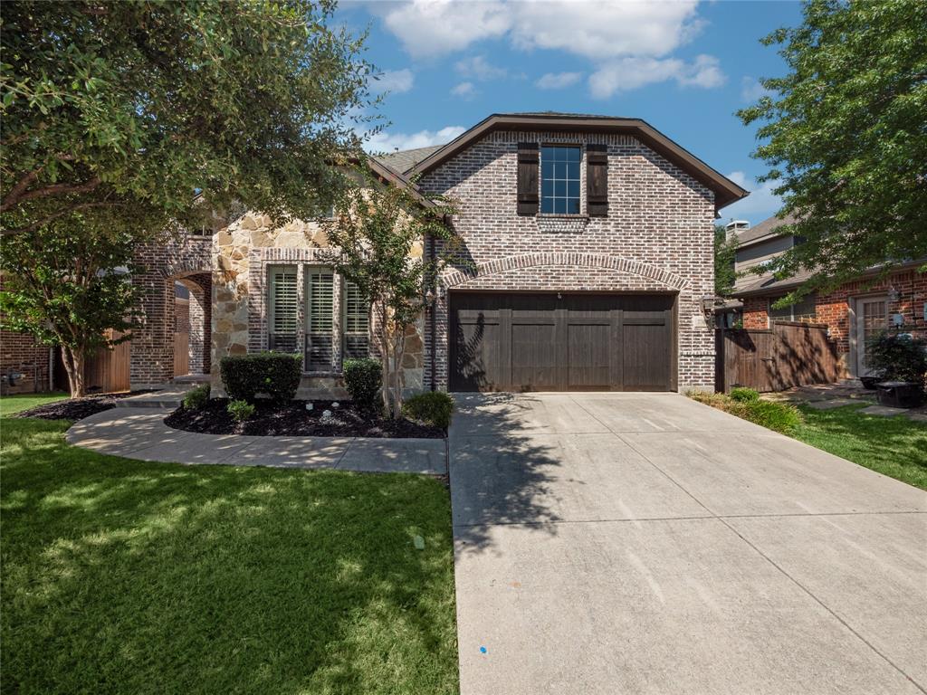 7704 Rockdale Road McKinney, TX 75071 - Photo 1 of 1 a front view of a house with a yard