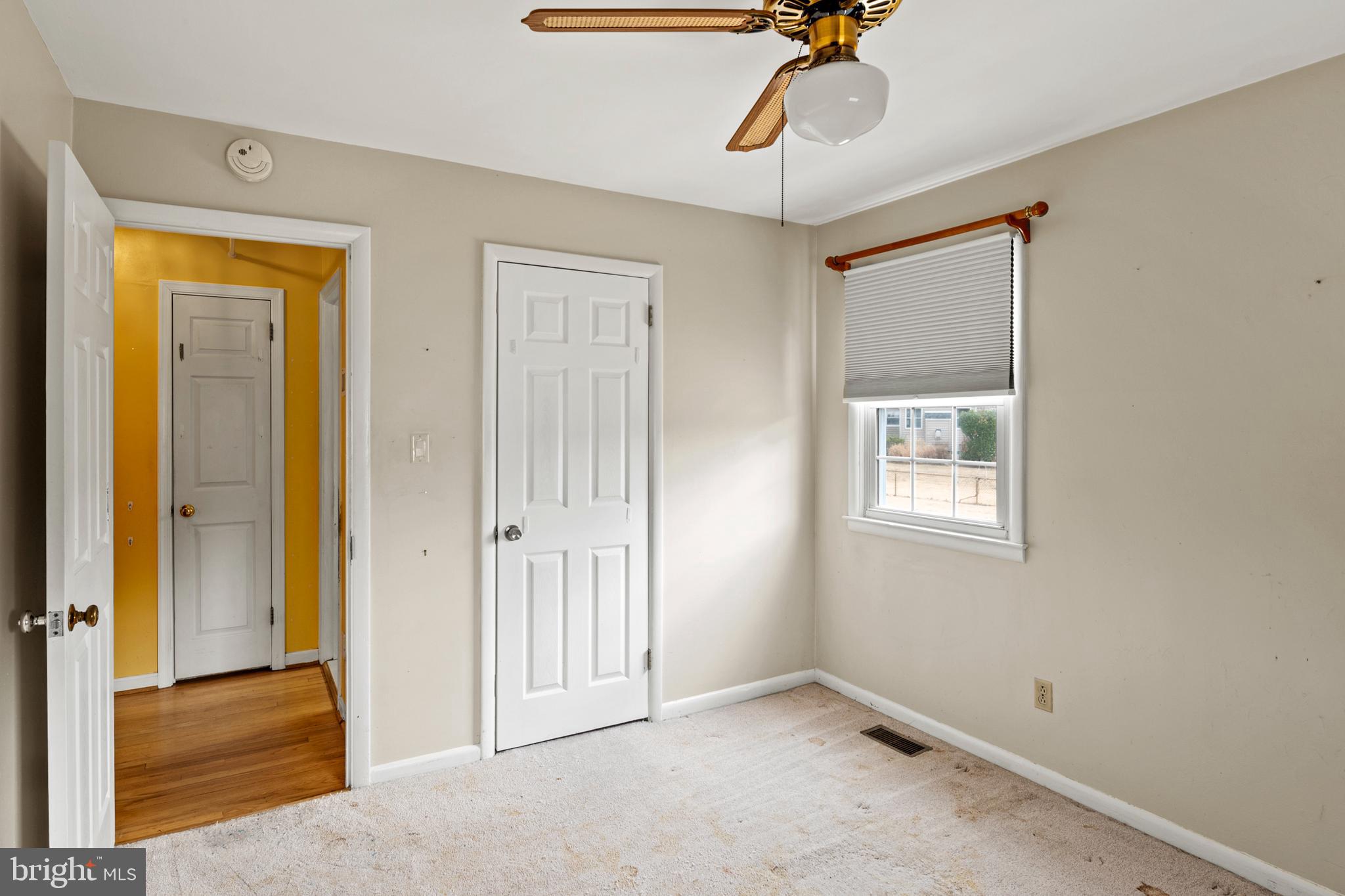 107 Holly Road Edgewater, MD 21037 - Photo 11 of 31 a view of an empty room with a window