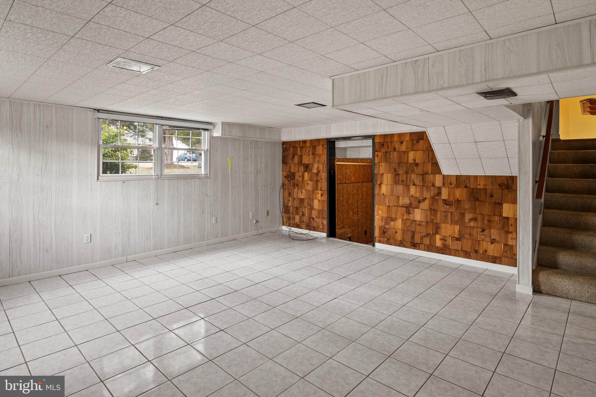107 Holly Road Edgewater, MD 21037 - Photo 13 of 31 an empty room with windows
