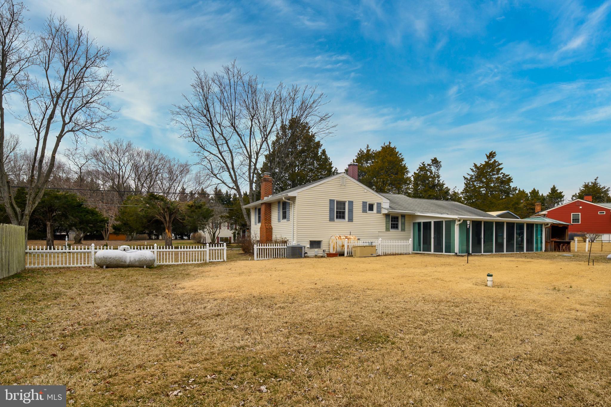 107 Holly Road Edgewater, MD 21037 - Photo 28 of 31 a front view of a house with a yard