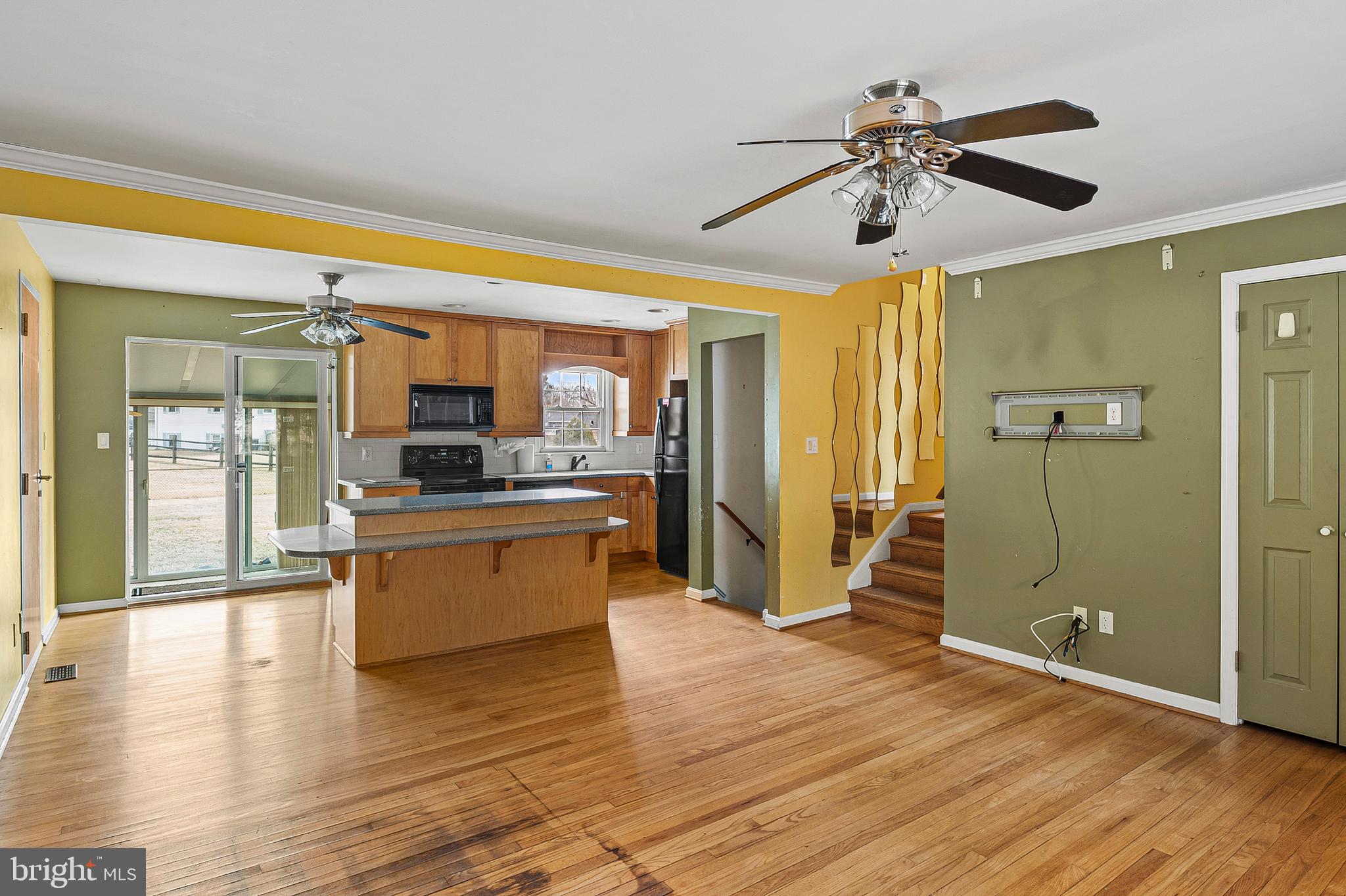 107 Holly Road Edgewater, MD 21037 - Photo 5 of 31 a large kitchen with lot of counter space and wooden floor