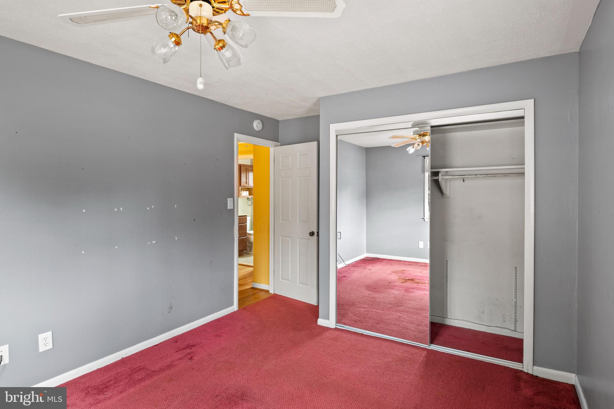 107 Holly Road Edgewater, MD 21037 - Photo 8 of 31 wooden floor in an empty room with a window