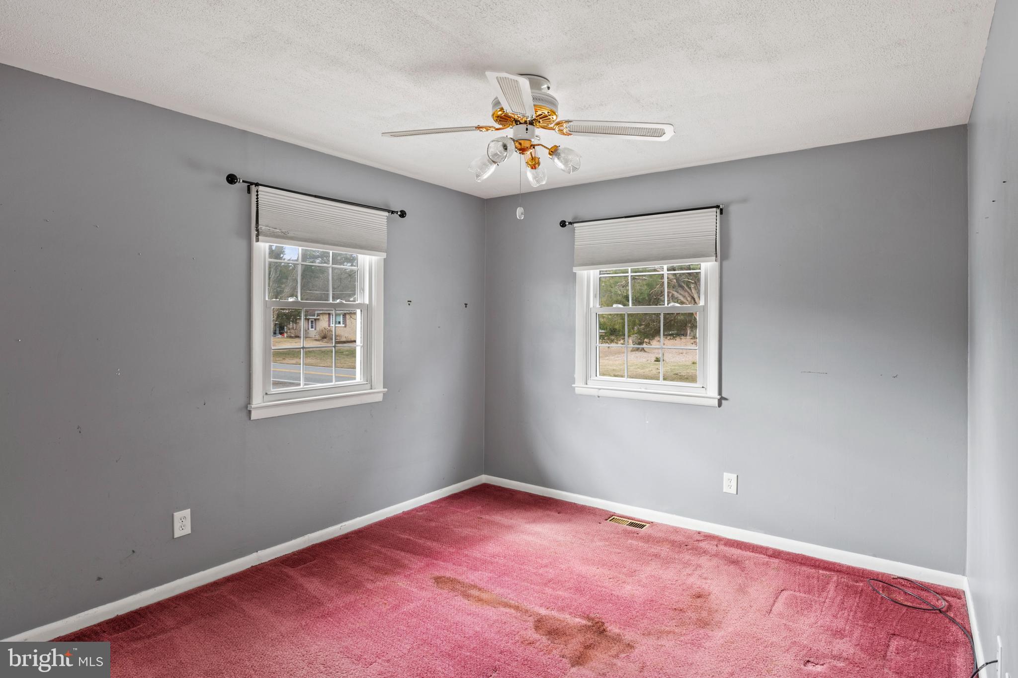 107 Holly Road Edgewater, MD 21037 - Photo 9 of 31 a view of an empty room with a window