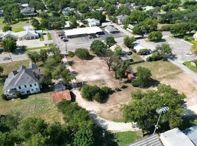 an aerial view of residential house with outdoor space