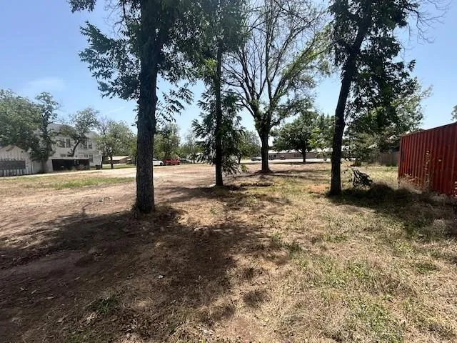 a view of road and trees