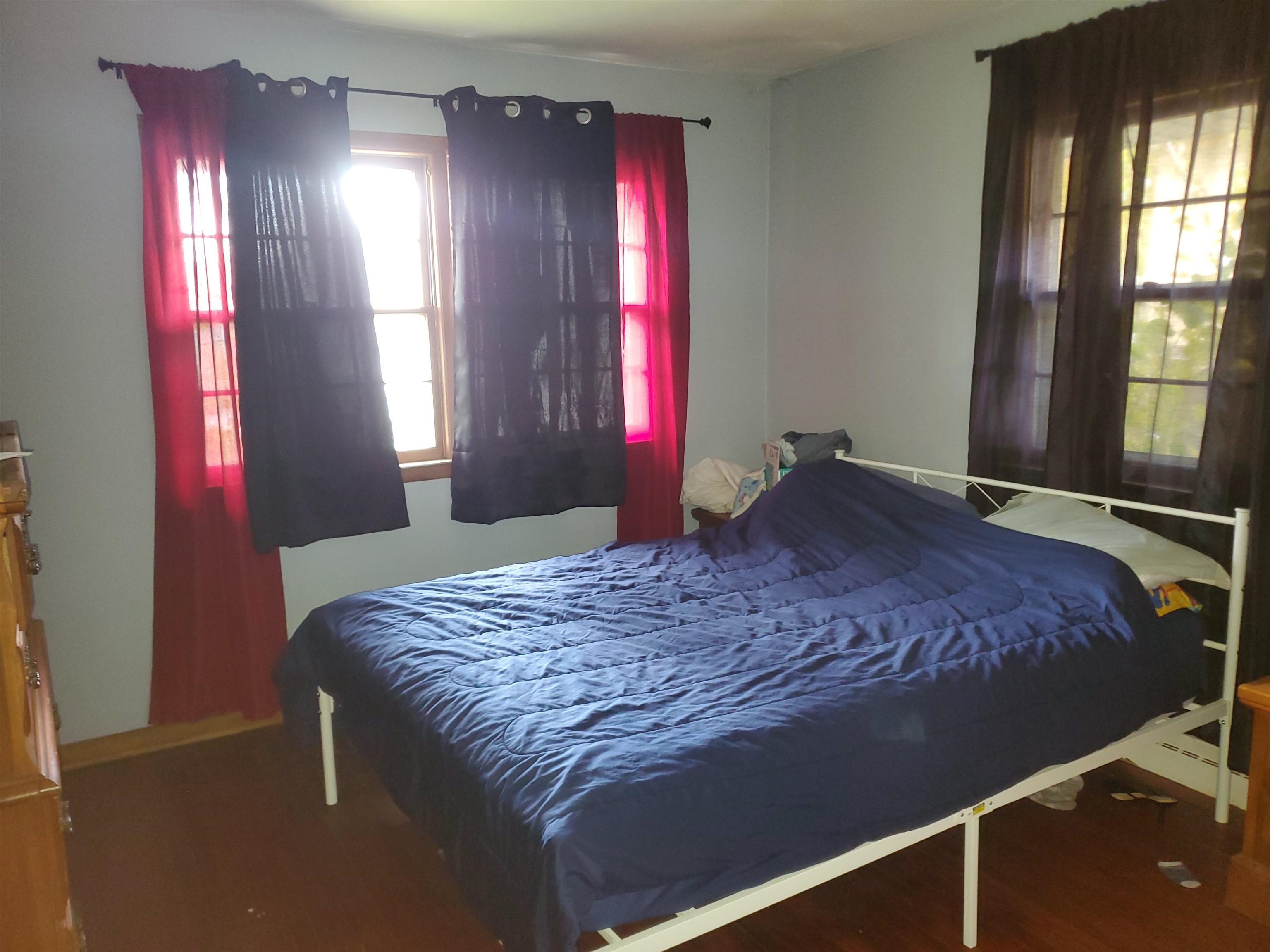 2511 Ashland Avenue Rockford, IL 61101 - Photo 10 of 15 a bedroom with a bed and window