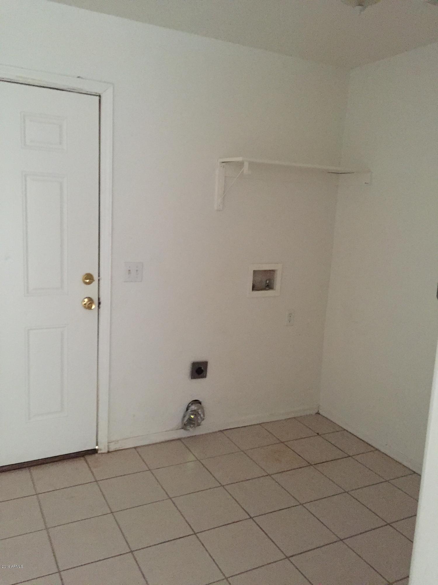 13302 South Del Rio Road Arizona City, AZ 85123 - Photo 10 of 16 Laundry and Back Door