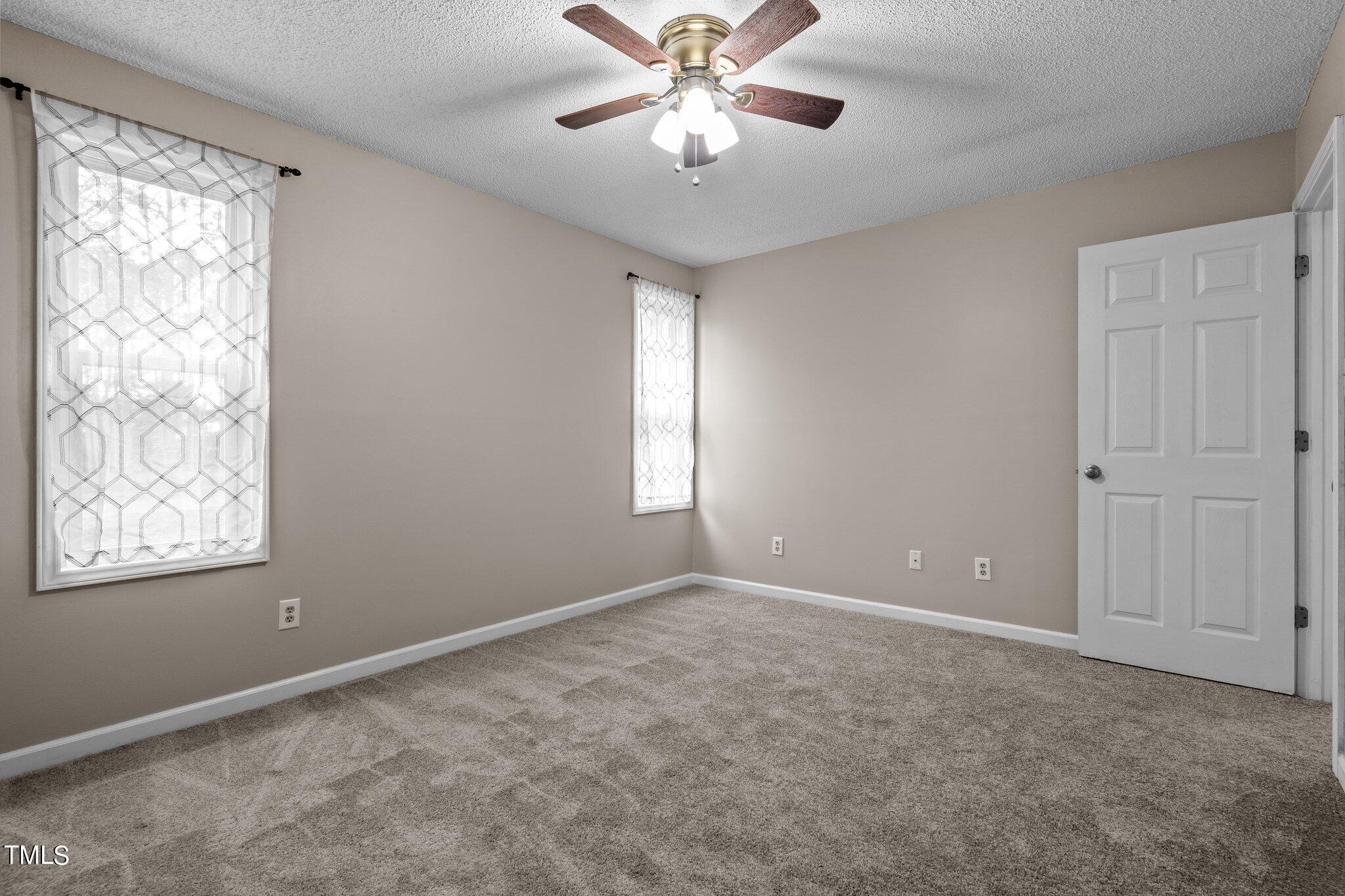 1129 Bermuda Run Knightdale, NC 27545 - Photo 19 of 34 a view of an empty room with a window