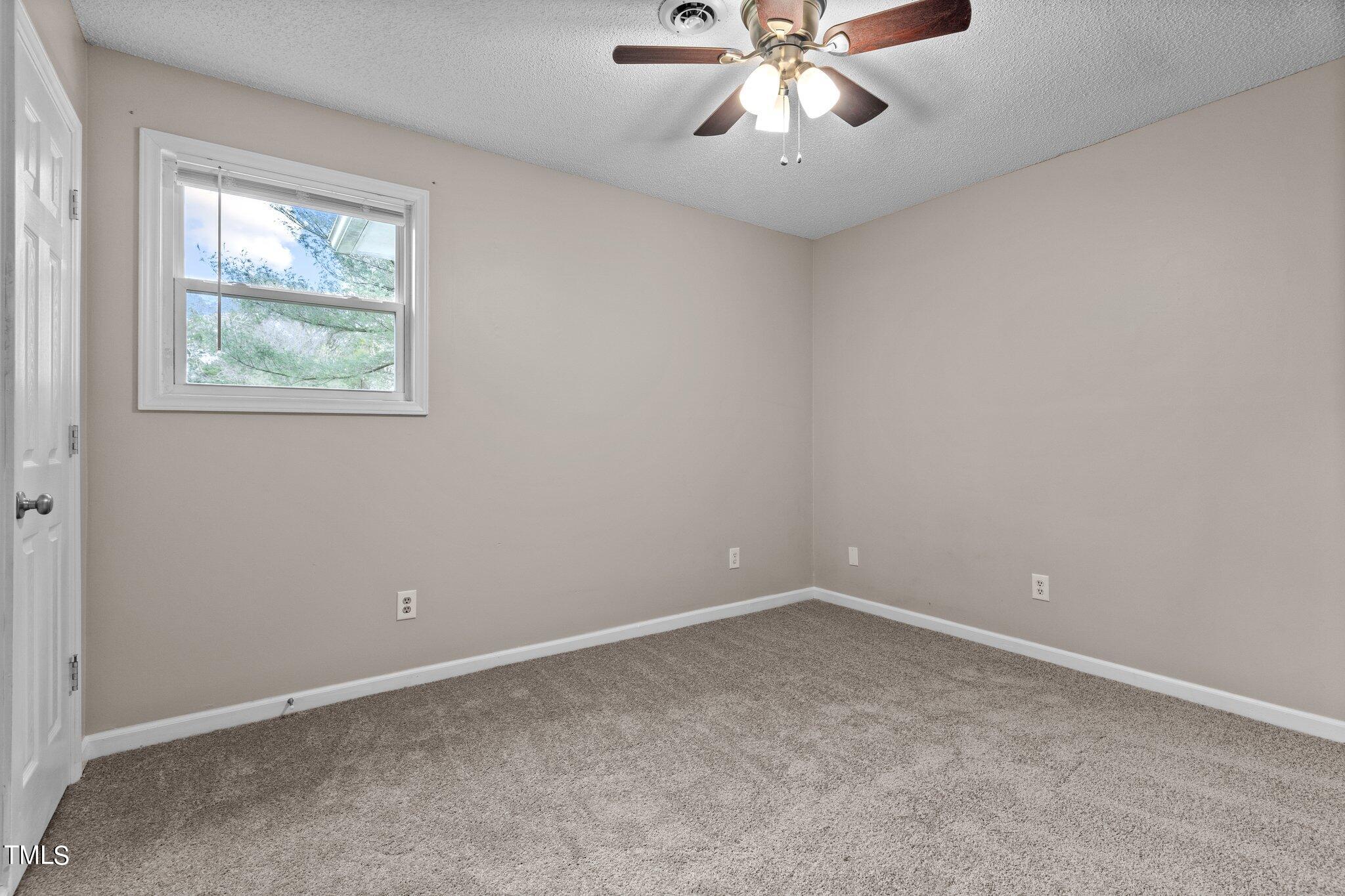 1129 Bermuda Run Knightdale, NC 27545 - Photo 21 of 34 an empty room with a window