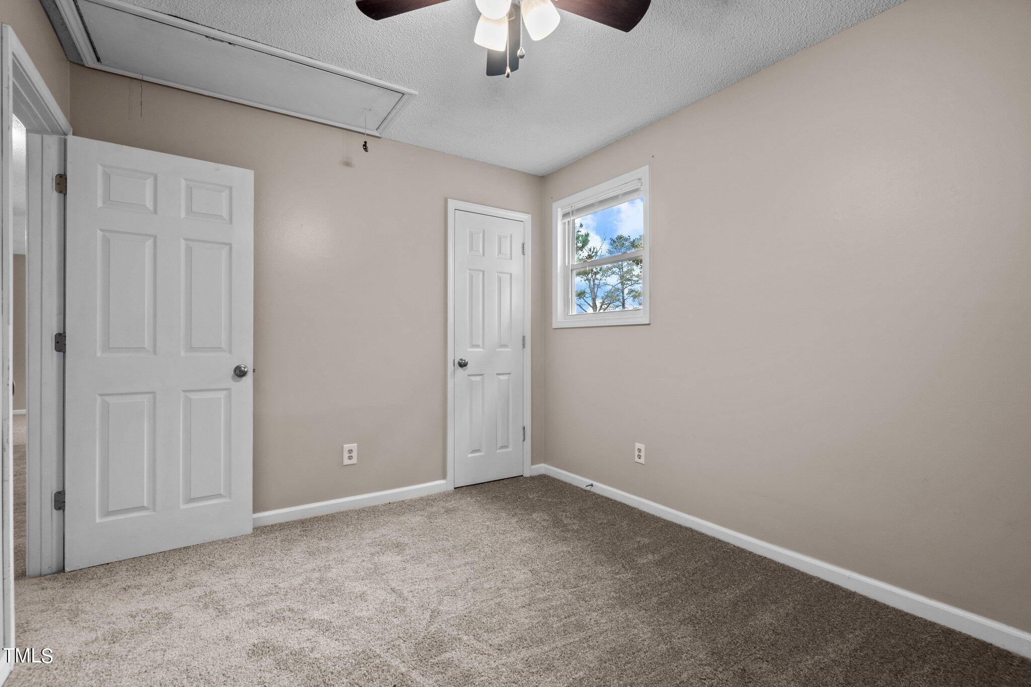 1129 Bermuda Run Knightdale, NC 27545 - Photo 22 of 34 a view of an empty room and window