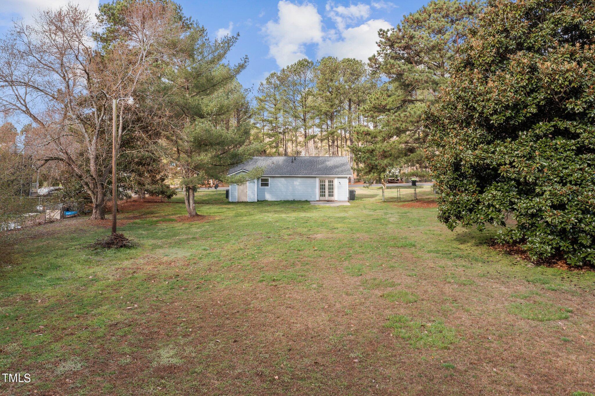 1129 Bermuda Run Knightdale, NC 27545 - Photo 28 of 34 a view of a trees in a yard