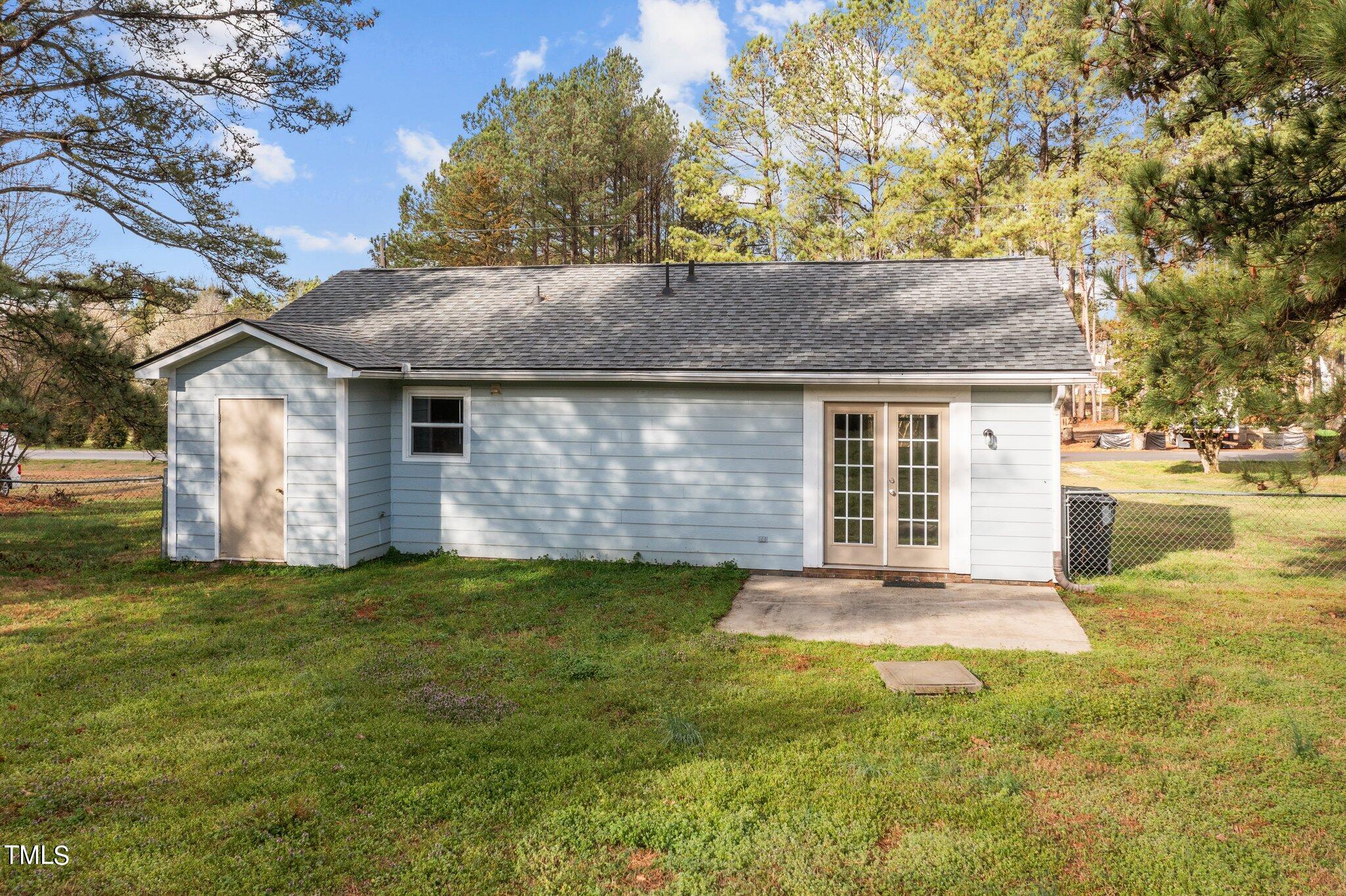 1129 Bermuda Run Knightdale, NC 27545 - Photo 29 of 34 a house view with a garden space